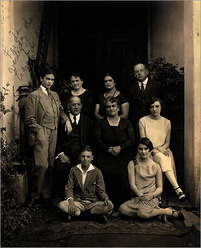 Black and white photograph of a family of 9 people