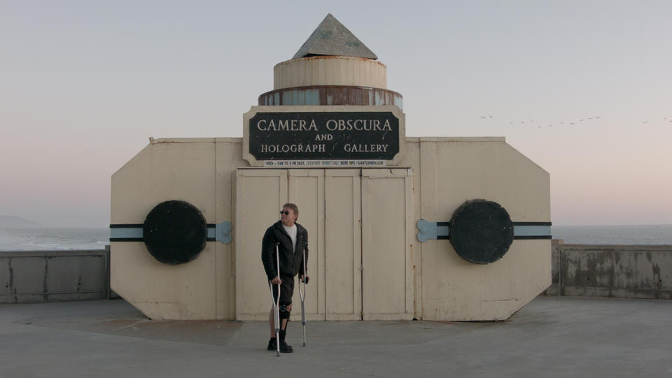 A man in front of the Camera Obscura