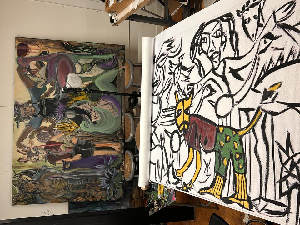 Two paintings in a studio space