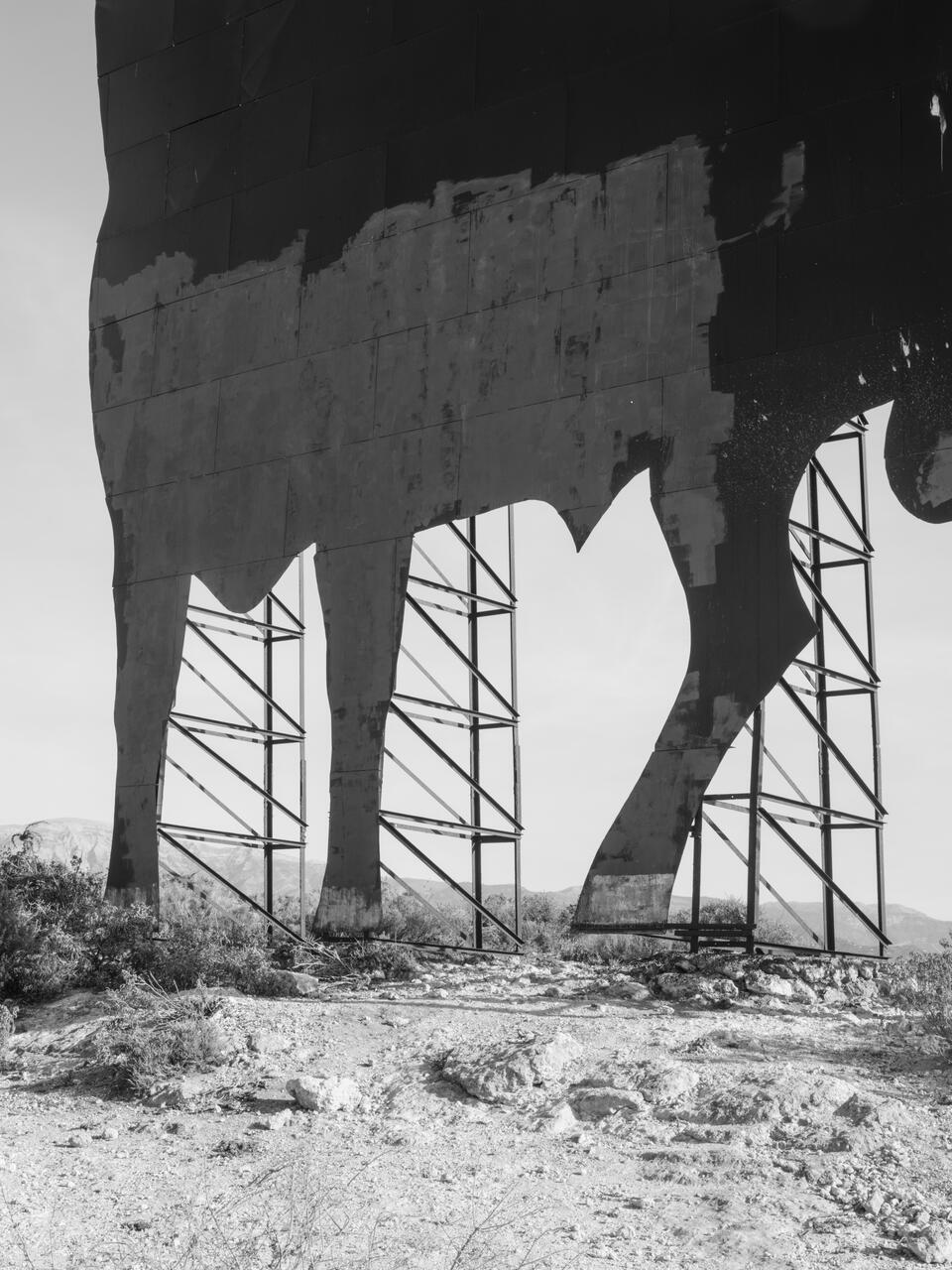 Black and white photograph of a part of a bull billboard located in Spain