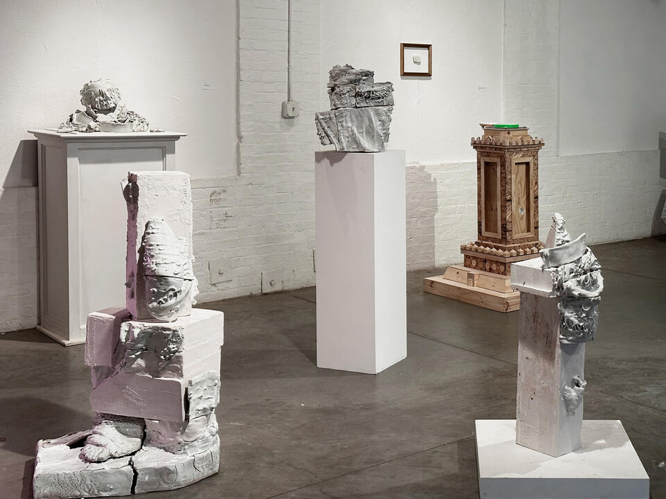 Glitched 3D printed ceramic replica of Venus de Milo, fragmented and cast into blocks of plaster in pieces.