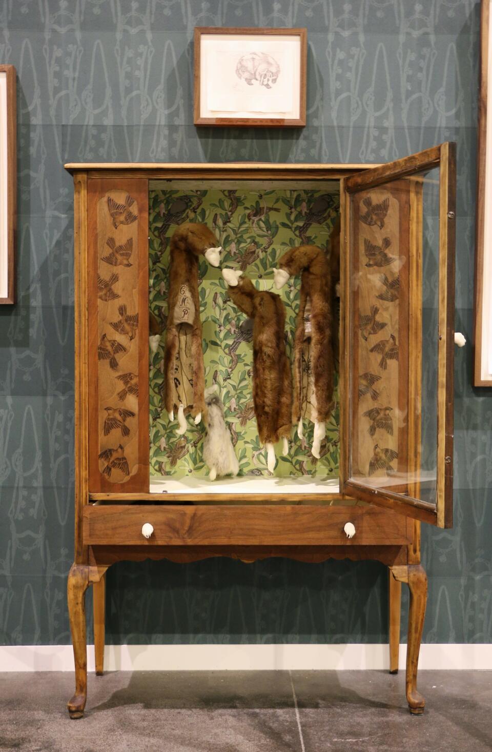 Cabinet with minks and rabbits inside