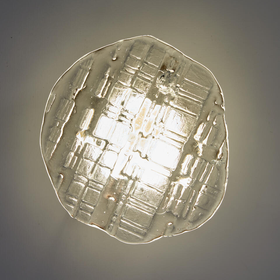 Wall sconce made of hot casted glass, brass, plexiglass & LED