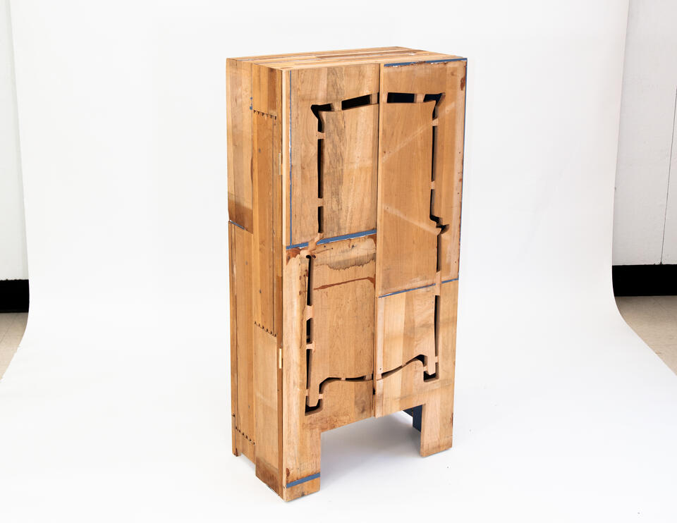 A Cabinet made from the deconstructed materials of a found dresser in blue.
