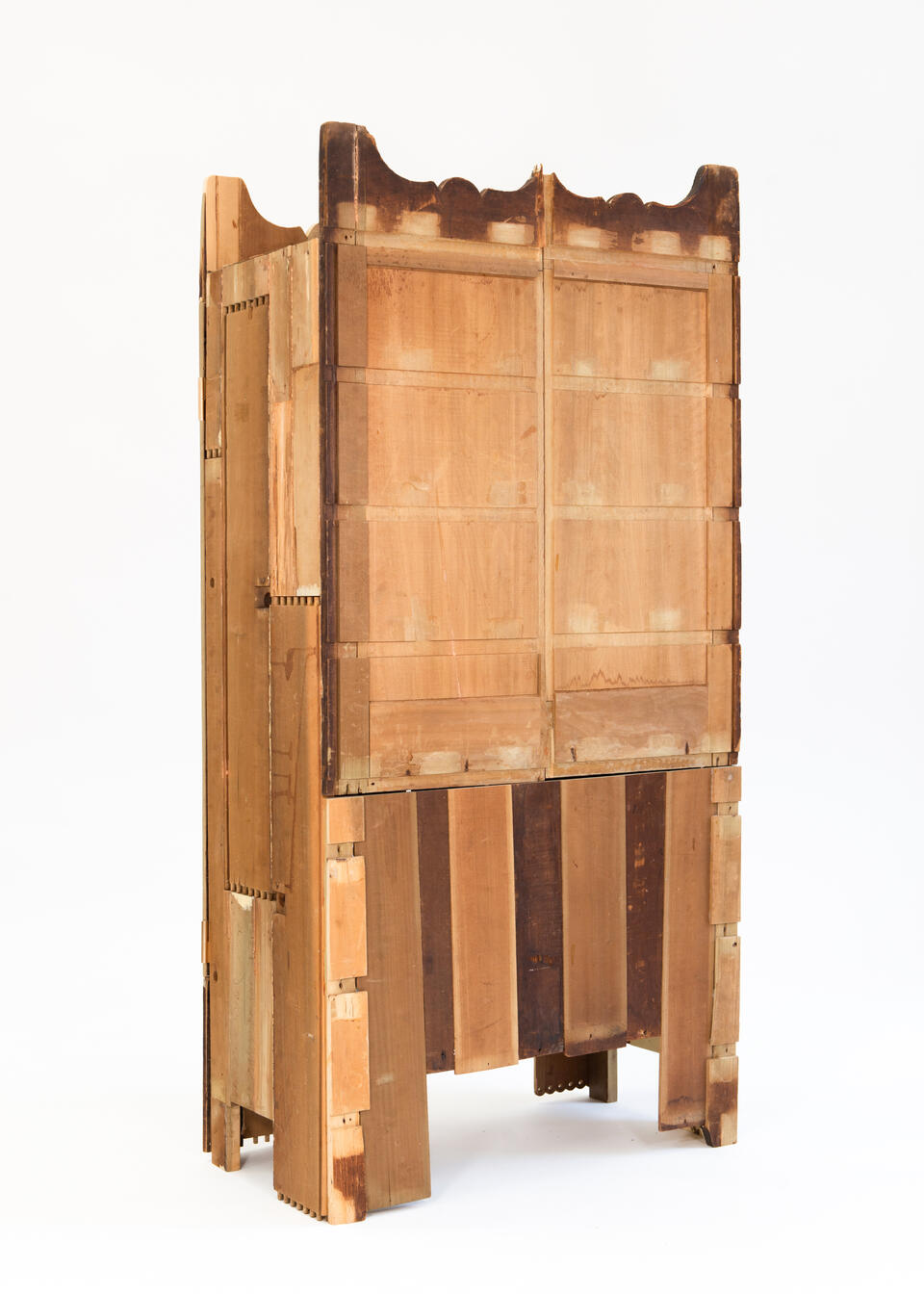 A Cabinet made from the deconstructed materials of a found dresser in warm yellow.