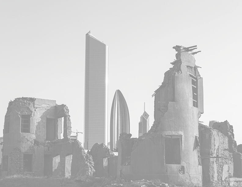 Black and white image of building in ruins, set against the back drop of the Kuwait city skyline.