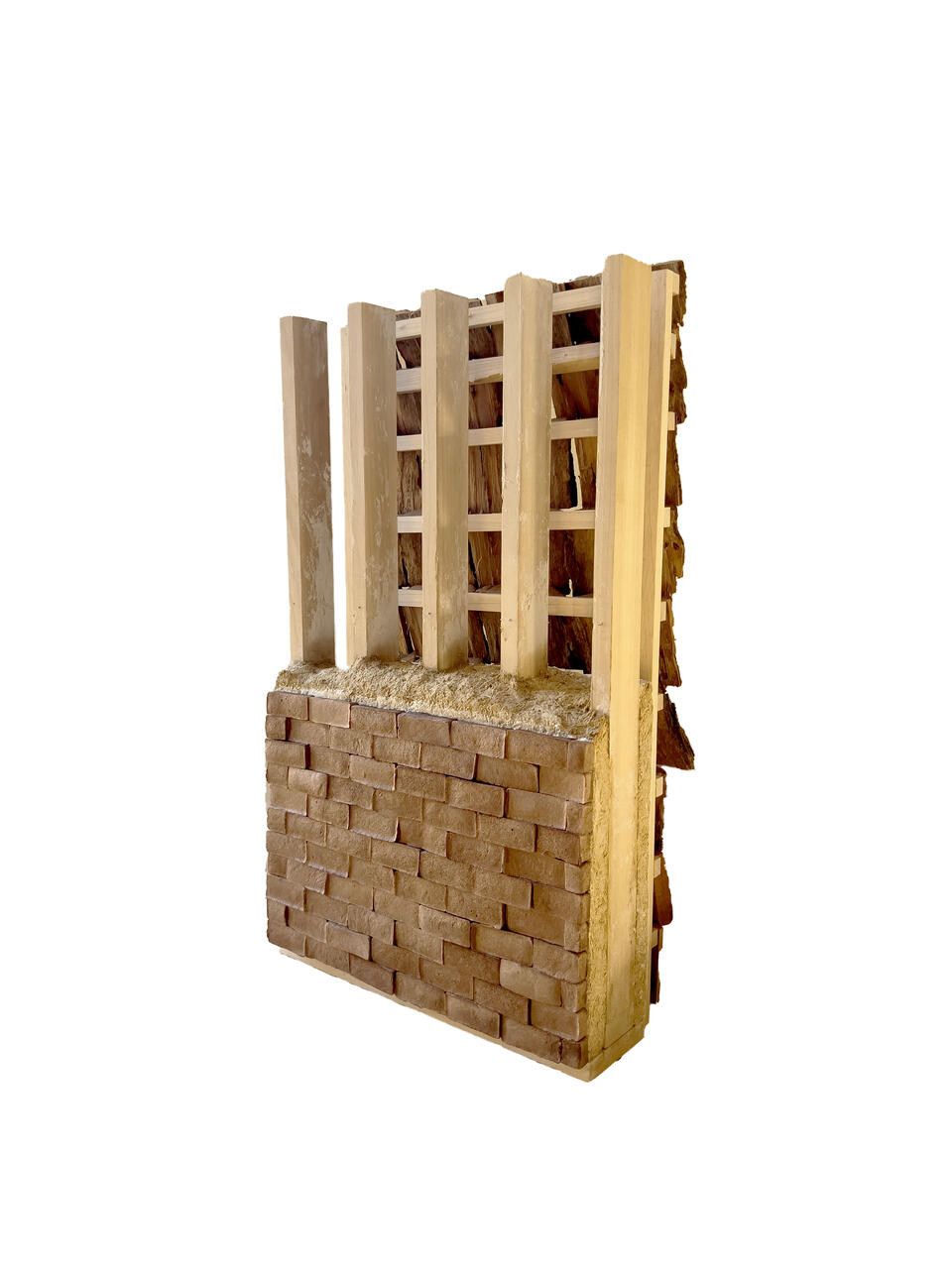 A ¼ scale detailed architectural section model of an ecological wall construction.